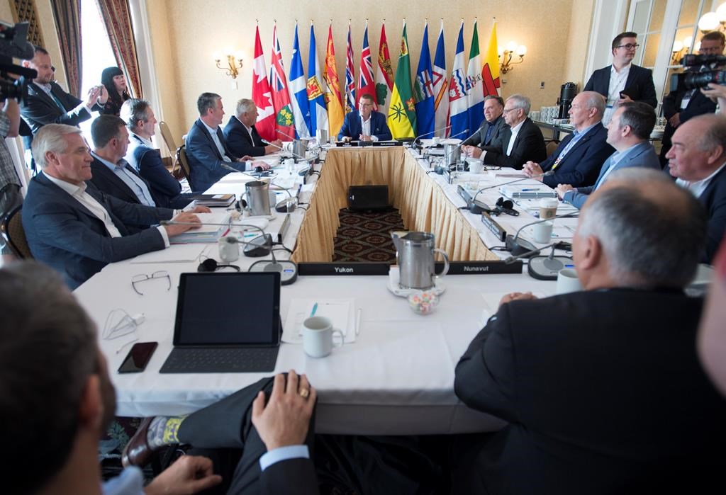 Canada's Premiers listen as Saskatchewan Premier Scott Moe addresses them during a meeting of Canada's Premiers in Saskatoon, Sask. Wednesday, July 10, 2019.