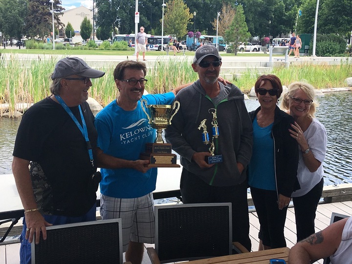 Darren Boudreau, middle, holds the first-place trophy after winning the Kelowna Yacht Club’s annual blind fishing derby in 2018. From left: Rodney Lozinski, Andy Cloutier, Darren Boudreau, Tana Cloutier and Gloria Lozinski.
