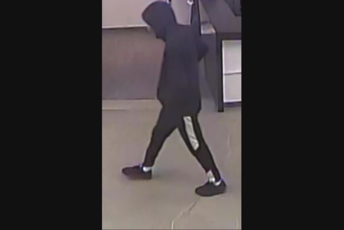 Security camera image of one of the two outstanding men wanted in an investigation into an alleged gunpoint kidnapping.