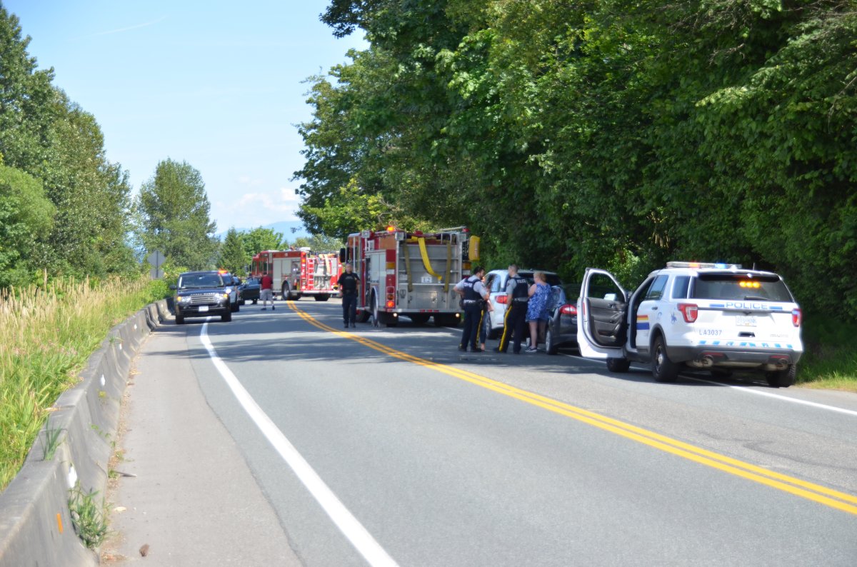 Police and ambulance on scene of a fatal rollover crash in Fort Langley Monday, July 1, 2019.