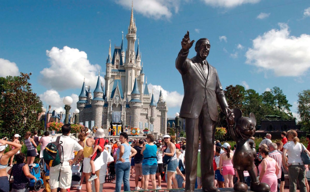 A Chicago tourist was banned from Disney World for life after she reportedly punched an employee.