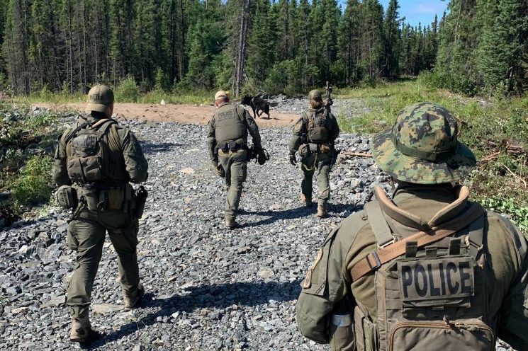 RCMP in Gillam continue to search for two suspects accused in three murders in B.C. on July 30, 2019. 