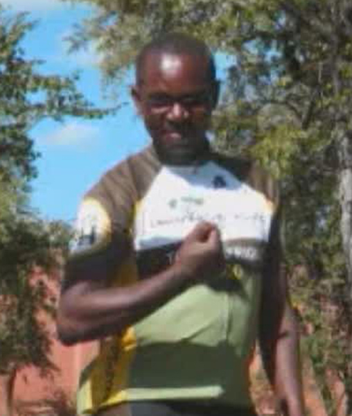 Charles Masala seen on a cycling trip through Africa in 2010.