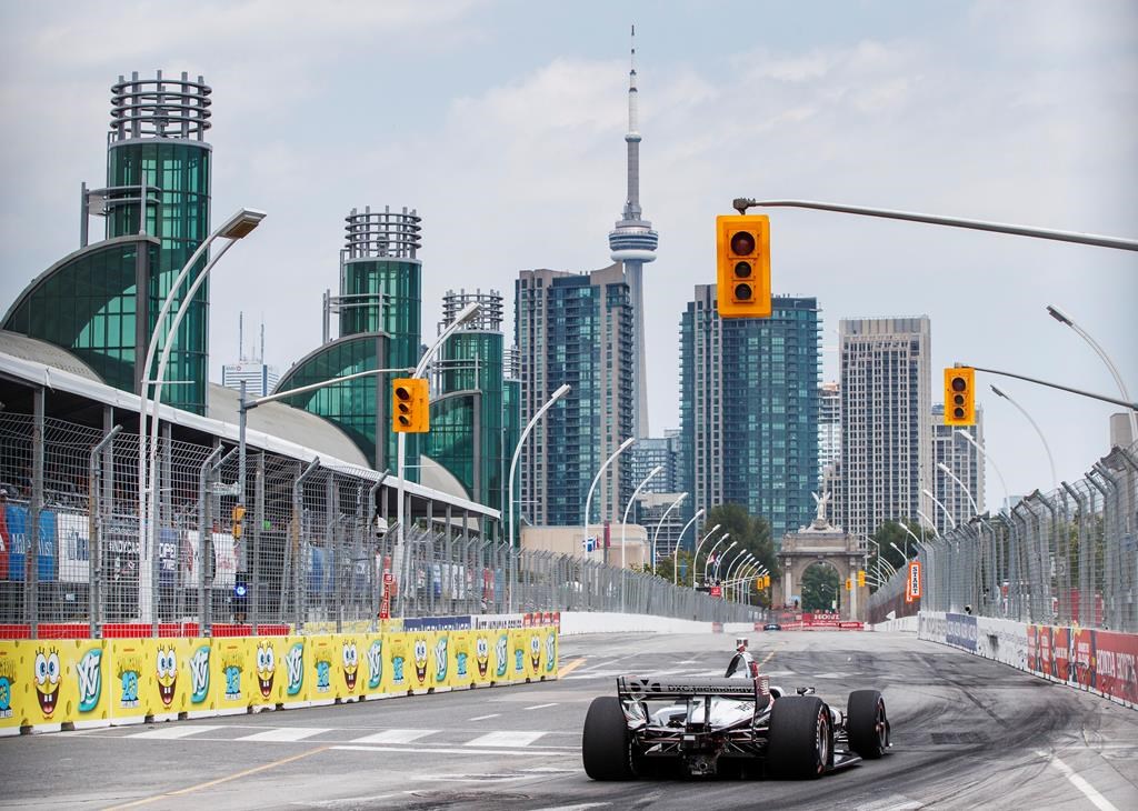 Simon Pagenaud of France drives on his way to winning first pole position during qualifying at the 2019 Honda Indy Toronto, in Toronto, Saturday, July 13, 2019. THE CANADIAN PRESS/Mark Blinch.