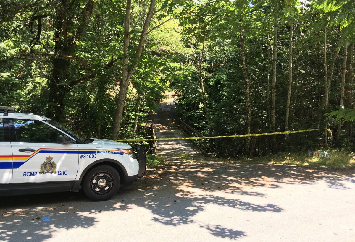 West Shore RCMP outside a home on Brookview Drive in Metchosin, B.C. on Saturday, July 13, 2019.