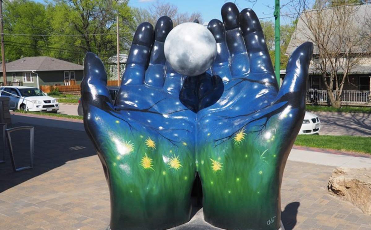 The art project is made up of a series of 50 hand statues, all with different themes.