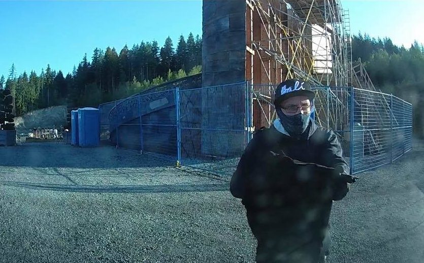 A since-deleted still image from dashcam video originally posted to social media appears to show a masked robbery suspect outside the victim's vehicle on a rural Maple Ridge property on Monday, July 8, 2019.