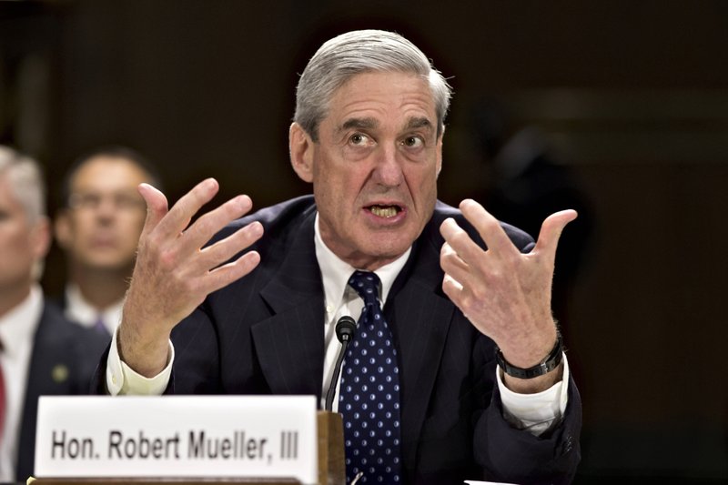 FILE - In this June 19, 2013, file photo, then-FBI Director Robert Mueller testifies on Capitol Hill in Washington. When special counsel Mueller testifies before Congress it will be a moment many have been waiting for, but it comes with risk for Democrats. 