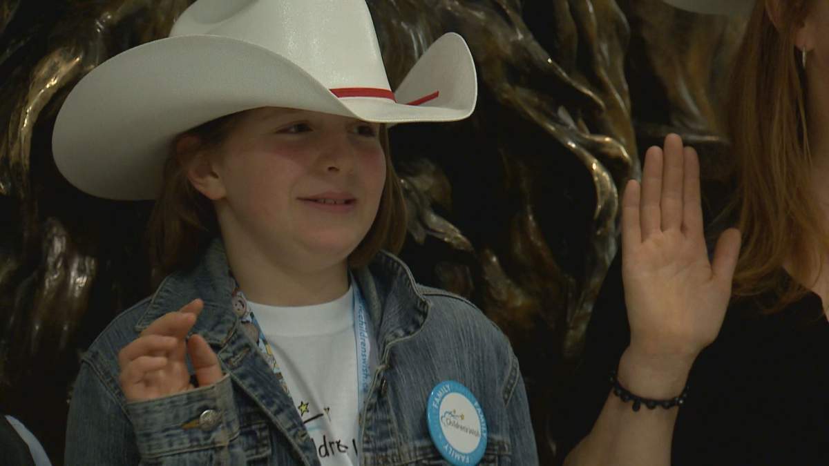 Anna Donovan-Harris takes the White Hat oath at YYC Calgary International Airport.