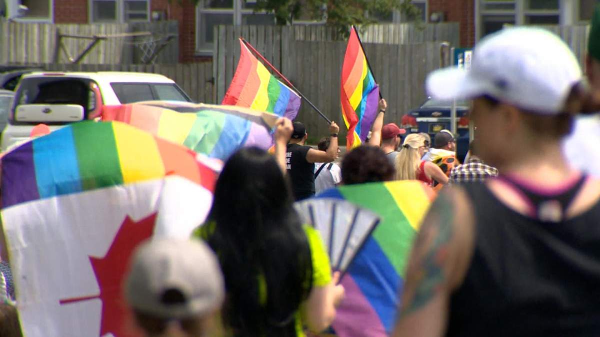 The homophobic graffiti was sprayed at the beginning of Pride week and just a few days later, hundreds of people marched through the community in support of the targeted couple.