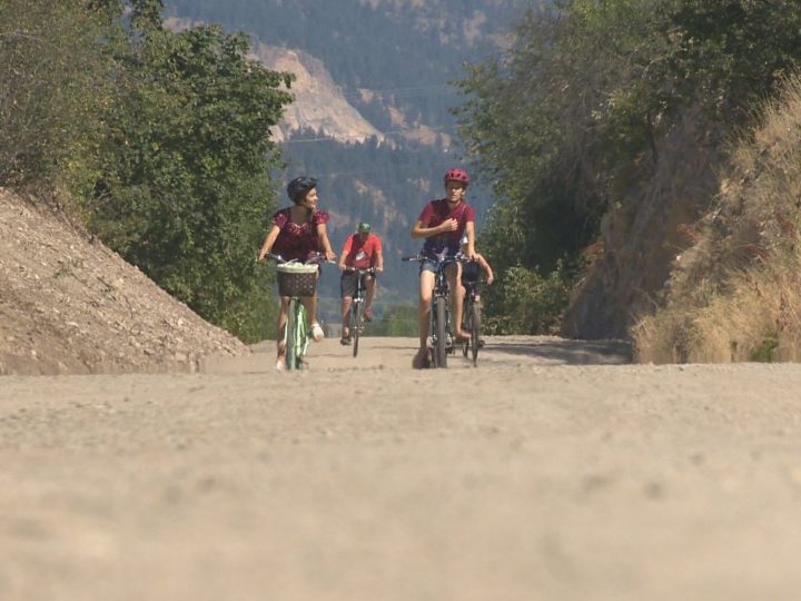 Cyclists on the Okanagan Rail Trail.