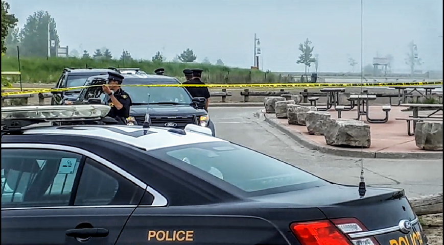 An increased police presence can be seen at the roundabout of Port Stanley's main beach as officers conduct a missing persons investigation, July 18, 2019.