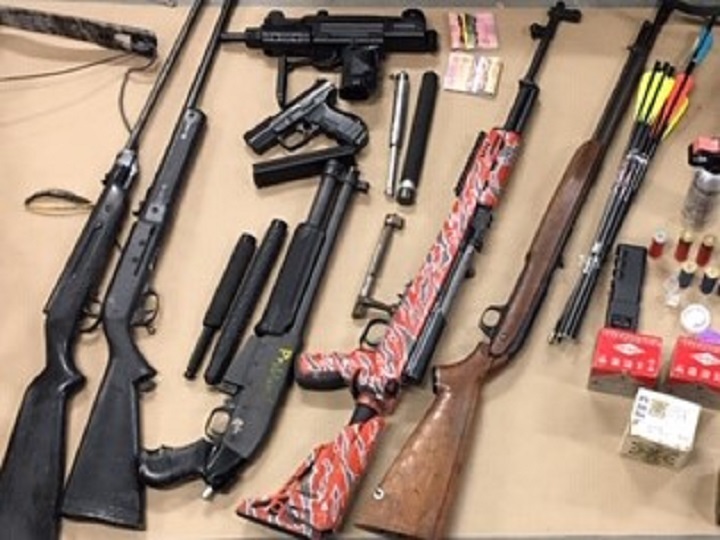The cache of weapons seized by West Kelowna RCMP during a major drug bust on July 28.