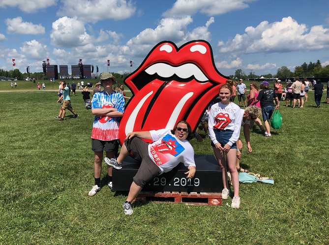 Donovan Workun and his kids at his 27th The Rolling Stones concert.