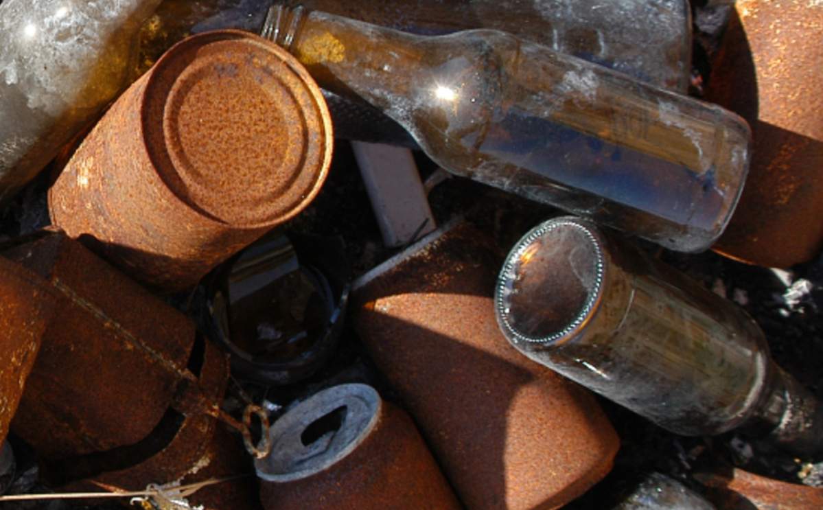A Kansas City family discovered a collection of vintage beer cans and whiskey bottles while doing home renovations.