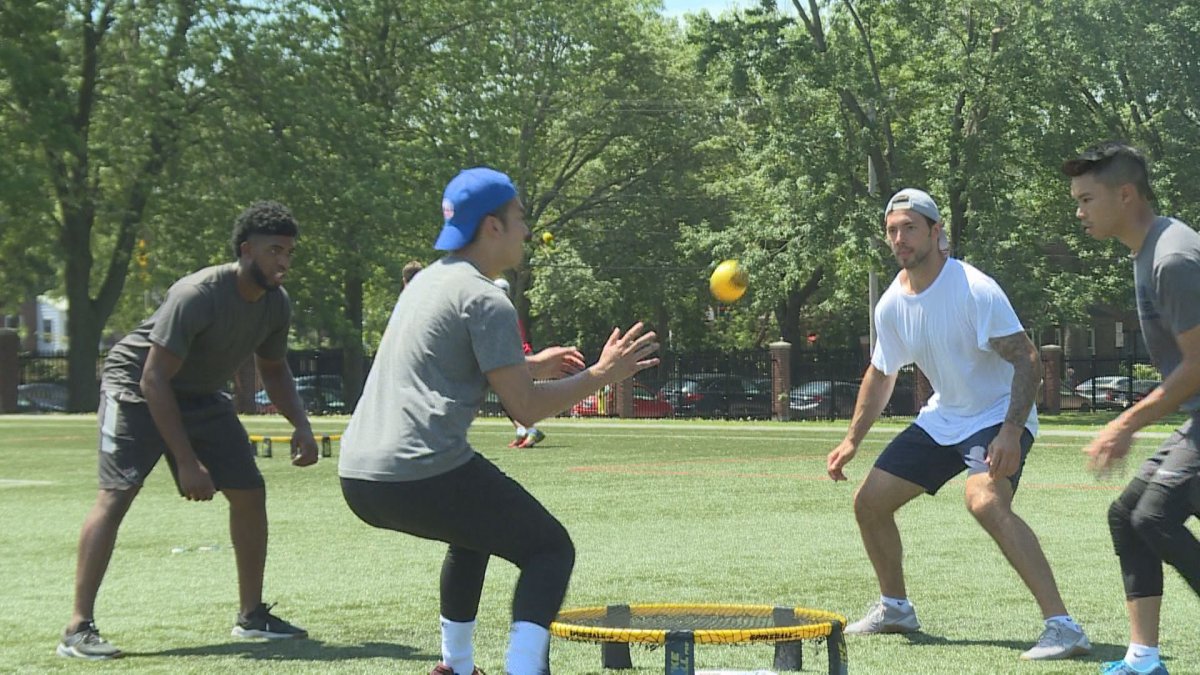NHL rivals Anthony Duclair (left) and Kris Letang (3rd from left) formed a spike ball team on Saturday in Montreal. Jul 13, 2019.