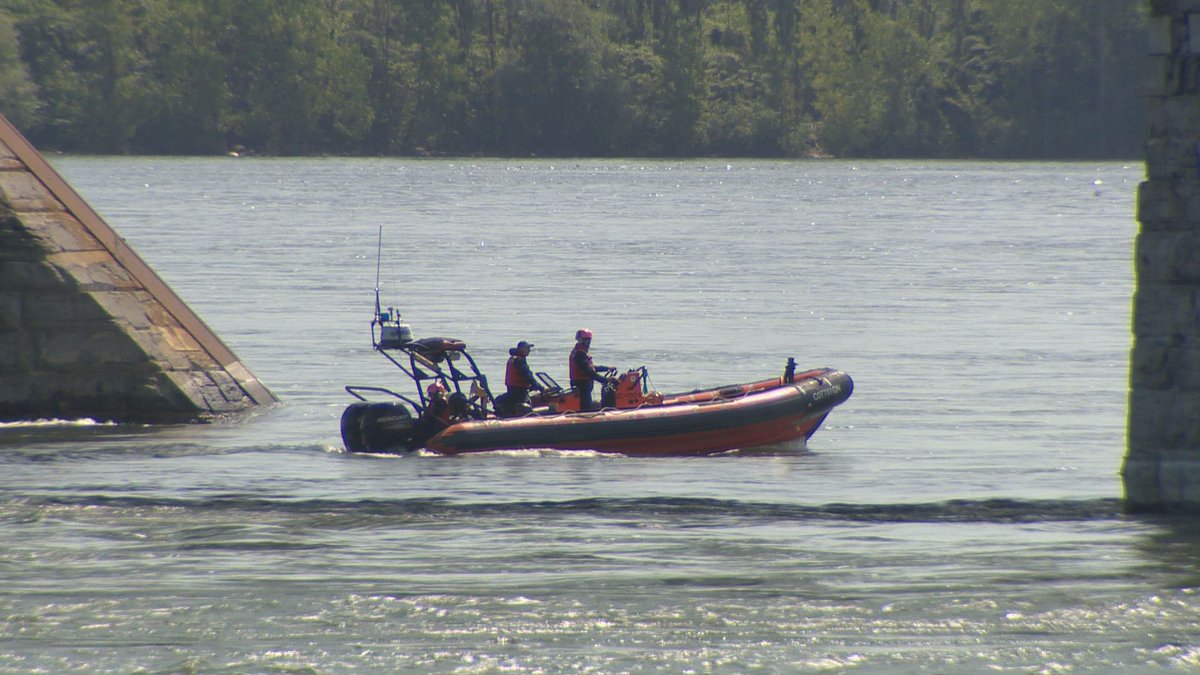 The small boat capsized on Monday in the St. Lawrence River.