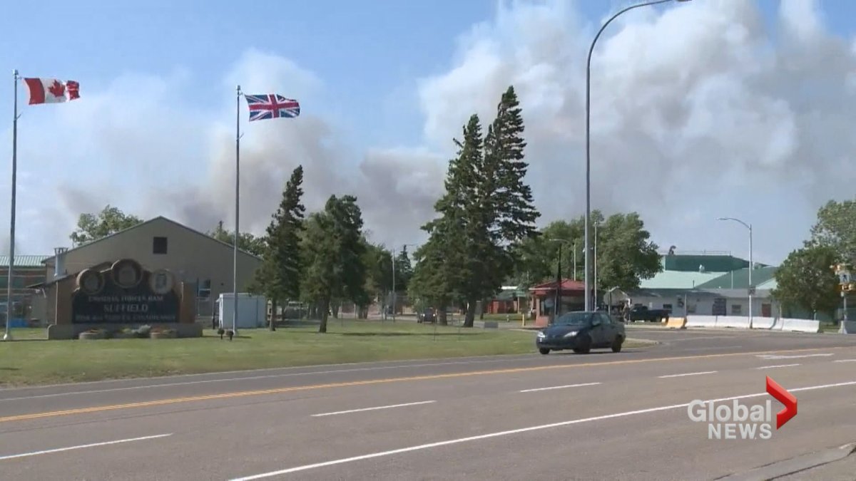 Smoke is seen in the sky near CFB Suffield as wildfires burn in Cypress County on Wednesday, July 24. 