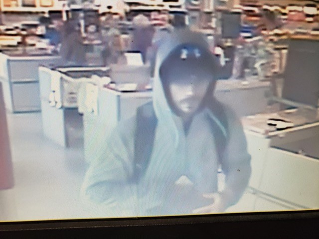 The suspect is described as a white man in his 20s with a goatee.