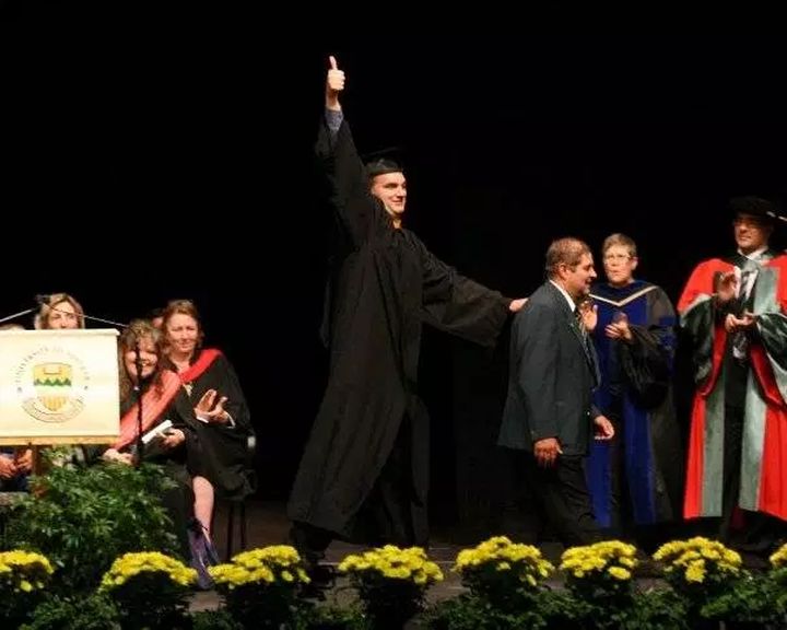 Wade Brown graduating with a Bachelor of Science in 2009.