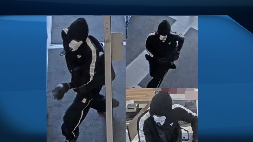 Police have released surveillance photos following a daytime bank robbery in Cambridge on Friday.