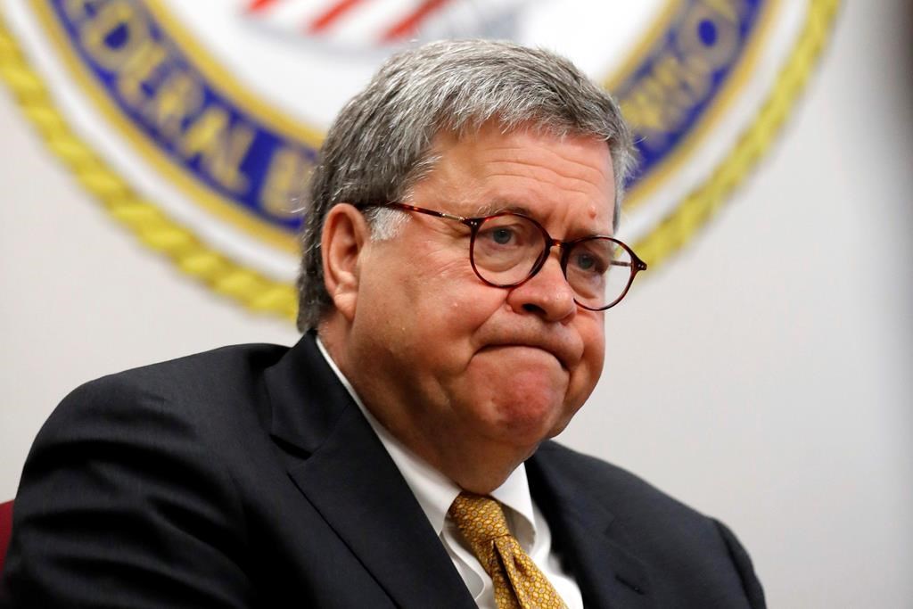 In this July 8, 2019 file photo, Attorney General William Barr speaks during a tour of a federal prison in Edgefield, S.C.
