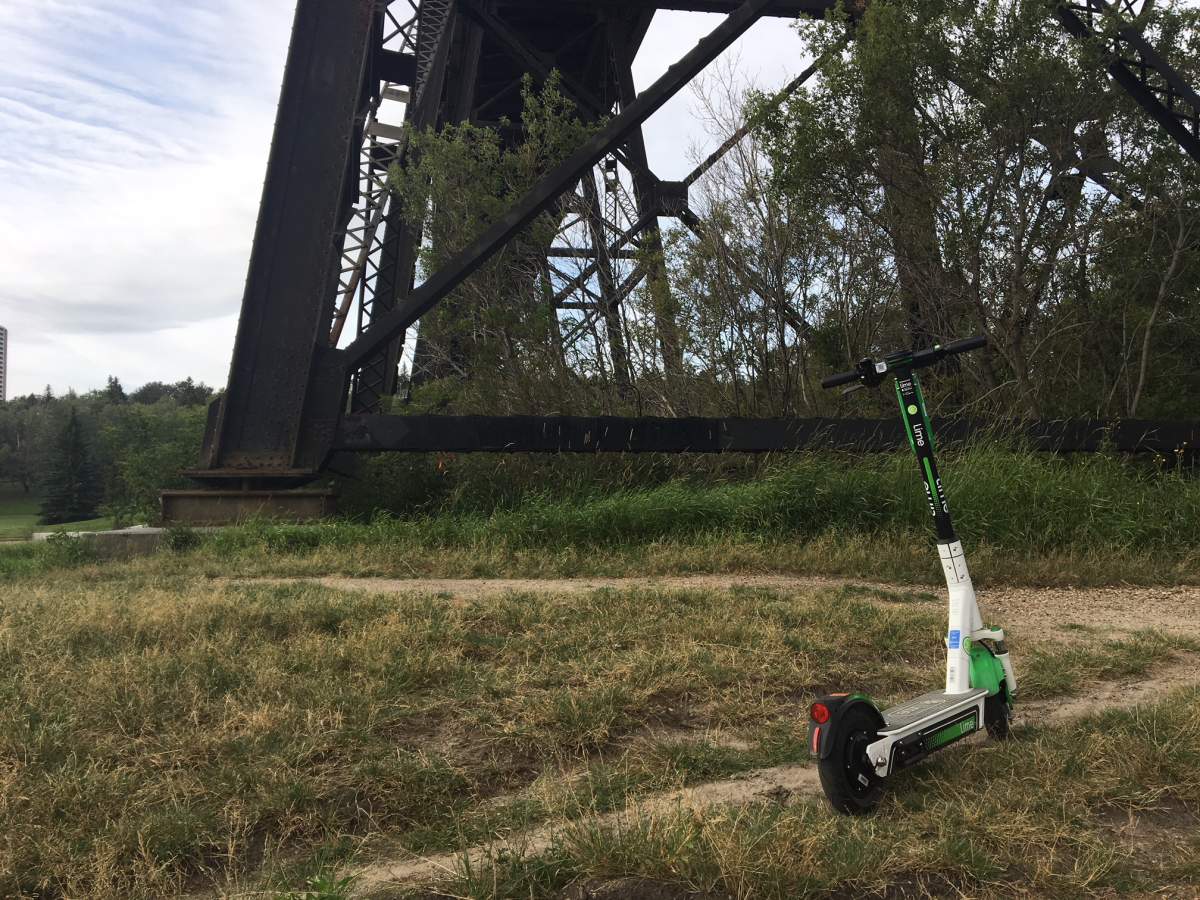 A Lime scooter sits under the High Level Bridge on Aug. 23, 2019, shortly after the company launched in Edmonton.