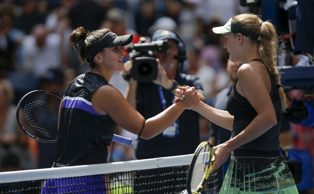 Bianca Andreescu, of Canada, shakes hands with Caroline Wozniacki, of Denmark, after winning their third round match of the US Open tennis championships Saturday, Aug. 31, 2019, in New York. 