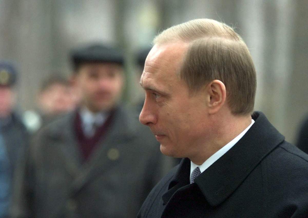 Acting Russian President and Presidential candidate Vladimir Putin speaks to the media near a polling station in Moscow, Sunday, March 26, 2000. Communist presidential candidate Gennady Zyuganov and the main reform candidate, Grigory Yavlinsky, both said Sunday they thought Vladimir Putin would not win the first round of presidential, elections and that a second tour would be needed.