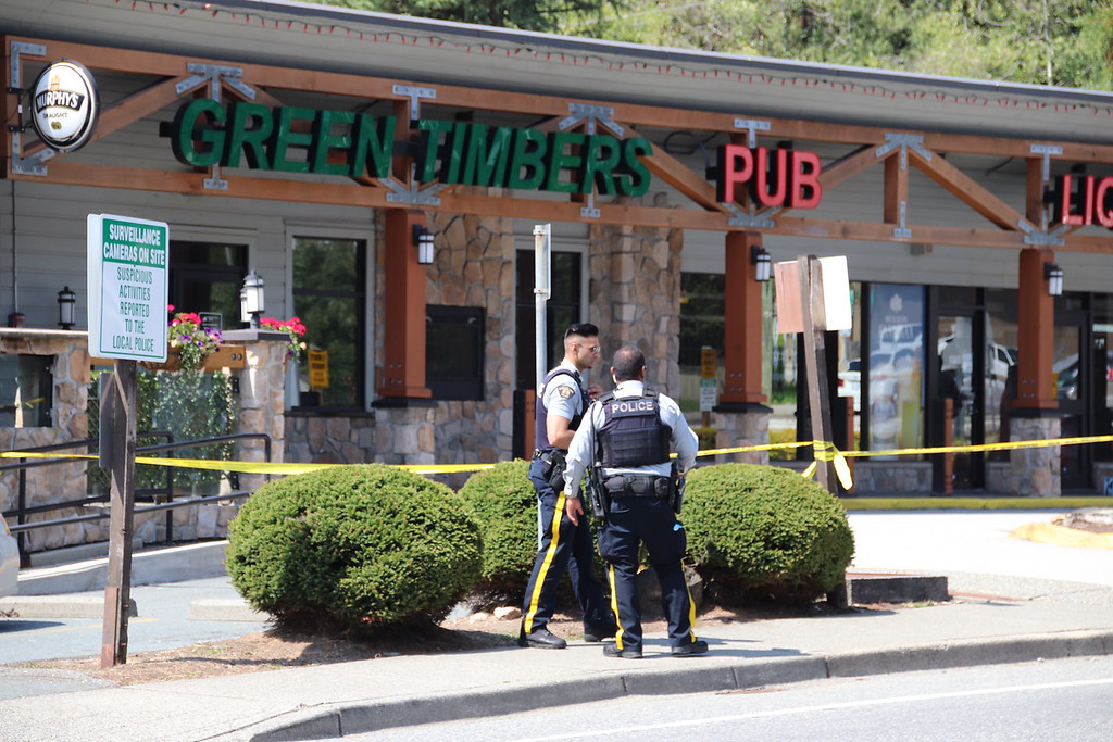 Police outside the Green Timbers Pub in Surrey to investigate a stabbing on Saturday, Aug. 3, 2019.
