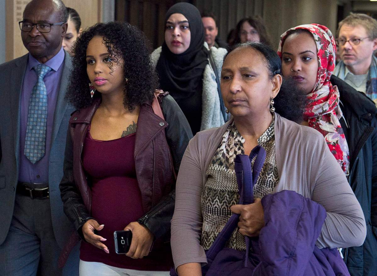 Fatouma Abdi, second from left, Abdoul Abdi’s sister, heads from Federal Court with supporters after a hearing to determine whether deportation proceedings should be halted for the former child refugee, in Halifax on Thursday, Feb. 15, 2018. The federal government wants to send Abdi back to Somalia because of his criminal history and his lack of Canadian citizenship. The judge has reserved his decision.