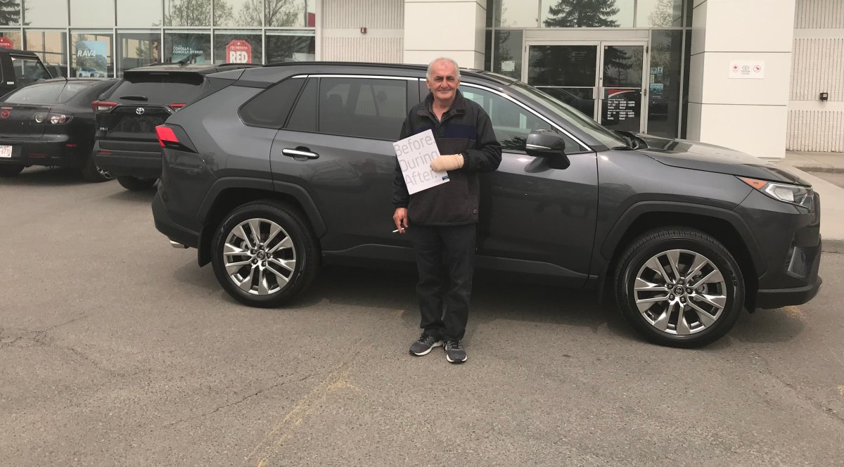 Photo of a man Calgary police believe to have used a stolen identity to purchase a new Toyota SUV on May 28, 2019.