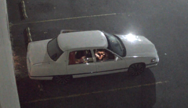 RCMP are searching for information about a white sedan associated with a shooting in Surrey.
