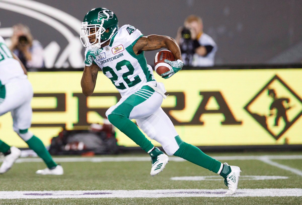 Saskatchewan Roughriders' Christion Jones runs the ball for a touchdown during second half CFL football action against the Hamilton Tiger-Cats, in Hamilton, Ont., Thursday July 19, 2018. 