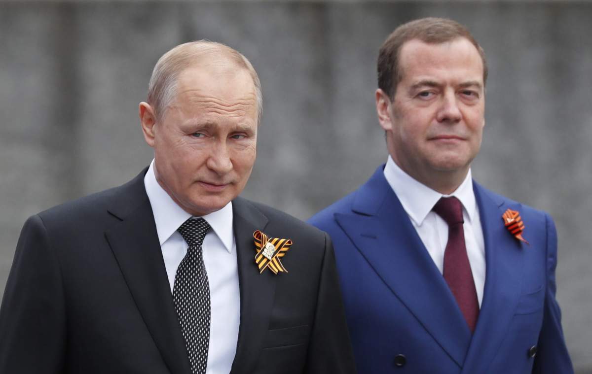 President of Russia Vladimir Putin (L), Prime Minister Dmitry Medvedev (R) arrive to watch Victory Day parade in Red Square in Moscow, Russia, 09 May 2019. Russia marks 09 May the 74th anniversary of the victory in the World War II over Nazi Germany and its allies. The Soviet Union lost 27 million people in the war.