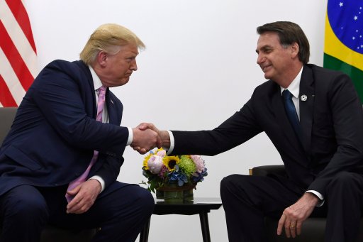 President Donald Trump, left, shakes hands with Brazilian President Jair Bolsonaro during a bilateral meeting on the sidelines of the G-20 summit in Osaka, Japan, Friday, June 28, 2019. (AP Photo/Susan Walsh)