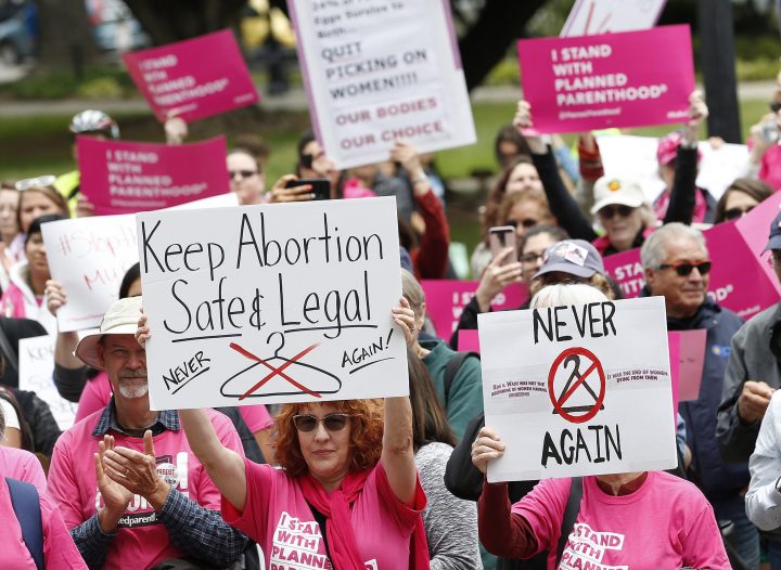 In this May 21, 2019 file photo, people rally in support of abortion rights at the state Capitol in Sacramento, Calif. 