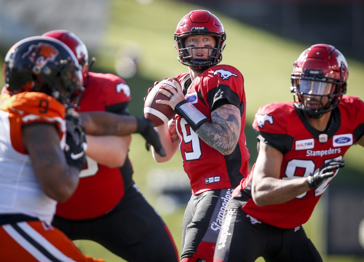 Calgary Stampeders quarterback Bo Levi Mitchell, centre, looks for a receiver during first half CFL football action against the B.C. Lions, in Calgary, Saturday, June 29, 2019. Calgary Stampeders quarterback Bo Levi Mitchell says he's ready to throw the football again. 