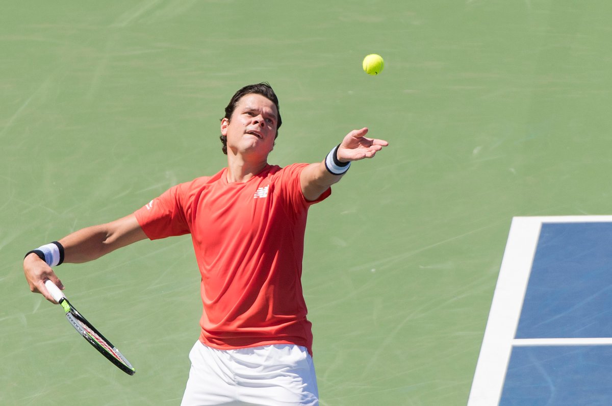 Milos Raonic of Canada serves to Lucas Pouille of France during their first round match at the Rogers Cup tennis tournament in Montreal, Monday, August 5, 2019. 