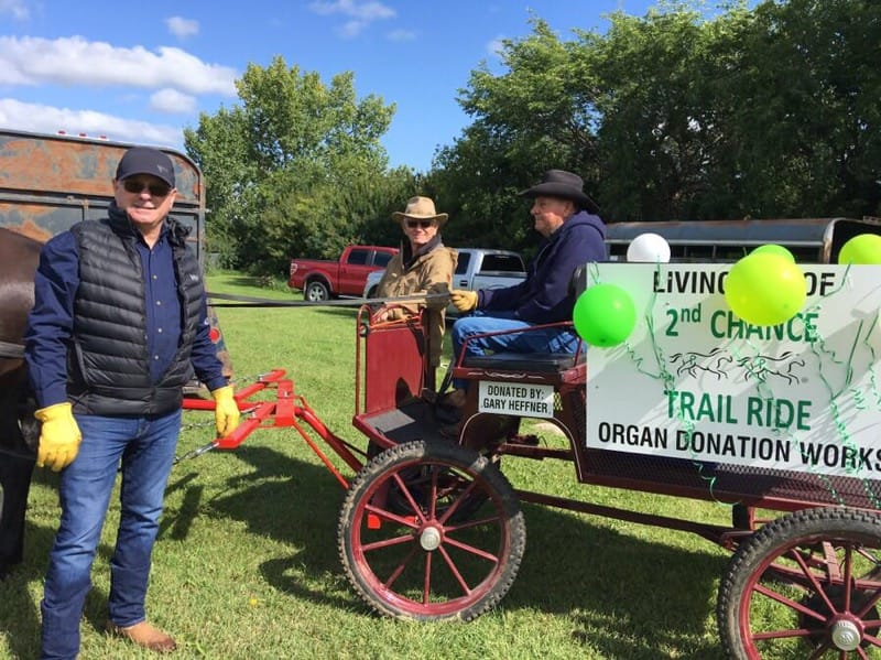 Morris Irvine (right) and the 2nd Chance chuckwagon prior to the Aug. 10 Clandonald Parade.