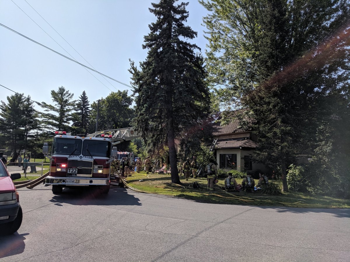 A woman in her 50s is being treated for "critical" burns and smoke inhalation in hospital after a fire broke out in a house on Farrow Street in Britannia on Thursday morning, according to Ottawa paramedics.