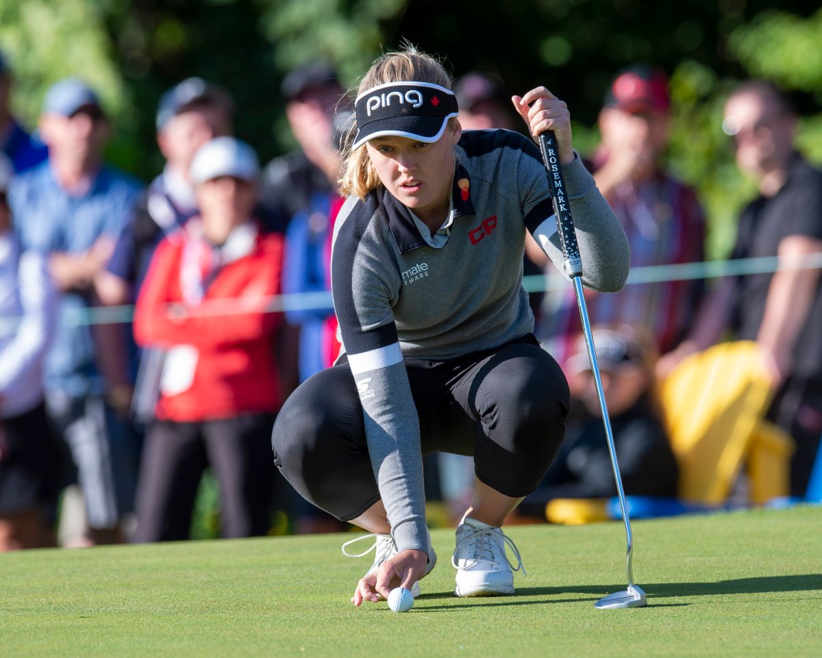 Brooke Henderson of Smith's Falls, Ont. lines up her putt on the second hole during the first round of the CP Women's Open in Aurora, Ontario, on Thursday August 22, 2019.