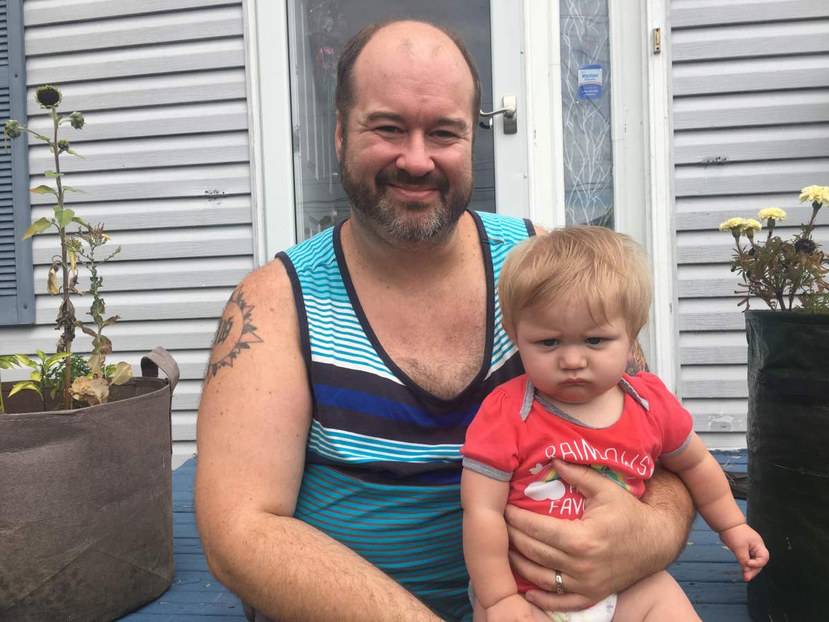 Bryn Jones-Vaillancourt and his husband say they regularly are forced to change their daughter in the sink due to not having access to a baby change table because they are typically only in female washrooms.