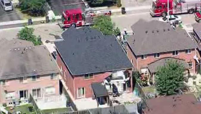 Damage can be seen on part of a home on Herdwick Street in Brampton following a house fire and explosion.