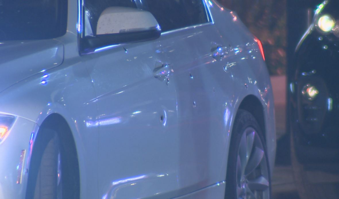A car on Lombard Street could be seen with multiple bullet holes.
