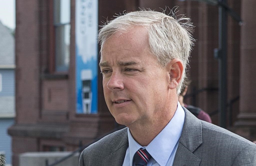 Dennis Oland and his wife Lisa arrive at the Law Courts in Saint John, N.B., on Friday, July 19, 2019.