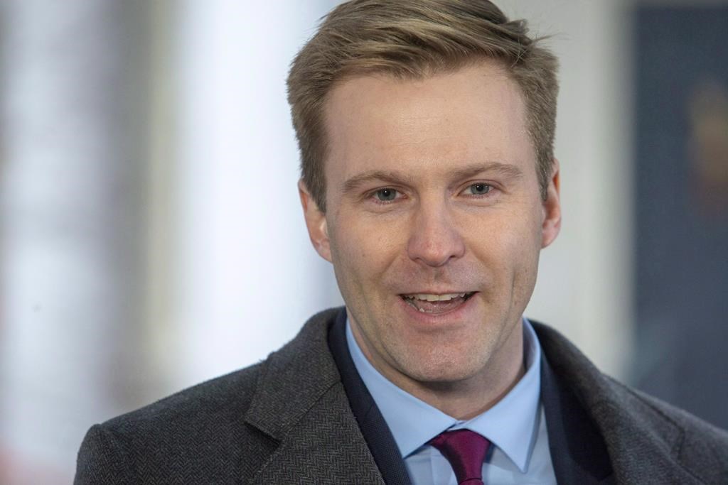 New Brunswick Liberal Leader Brian Gallant answers questions from the media in Fredericton on Nov. 2, 2018. Former New Brunswick premier Brian Gallant has a new job with Toronto's Ryerson University.Gallant announced on Facebook that he has accepted the role of special advisor to the to the president of the university on innovation, cybersecurity, and law.