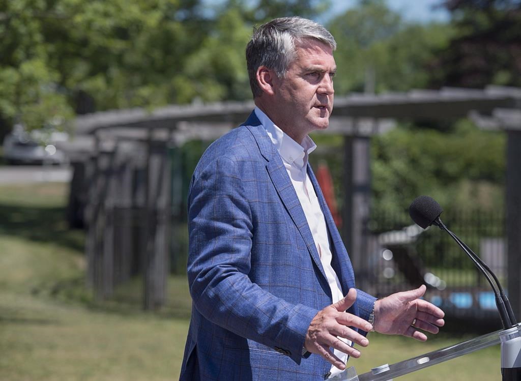 Nova Scotia Premier Stephen McNeil talks with reporters as the Canadian premiers meet in St. Andrews, N.B. on July 19, 2018.