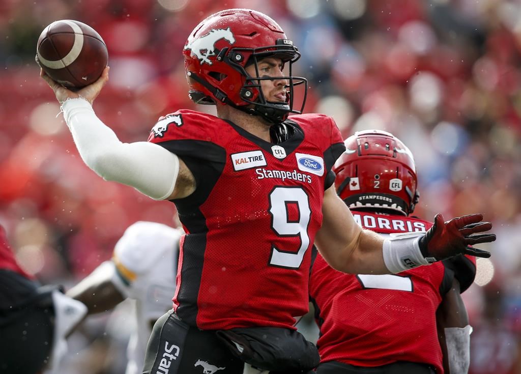 Then-Calgary Stampeders quarterback Nick Arbuckle throws the ball during first half CFL football action against the Edmonton Eskimos, in Calgary on Aug. 3, 2019. signed a two-year deal with the Ottawa Redblacks on Friday, Jan. 31, 2020.