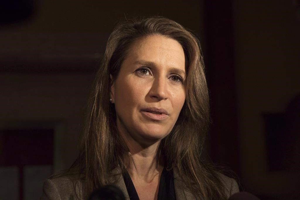 Ontario Francophone Affairs Minister Caroline Mulroney speaks to reporters following an early morning PC Caucus meeting at the Ontario Legislature in Toronto on Thursday, November 29, 2018.
